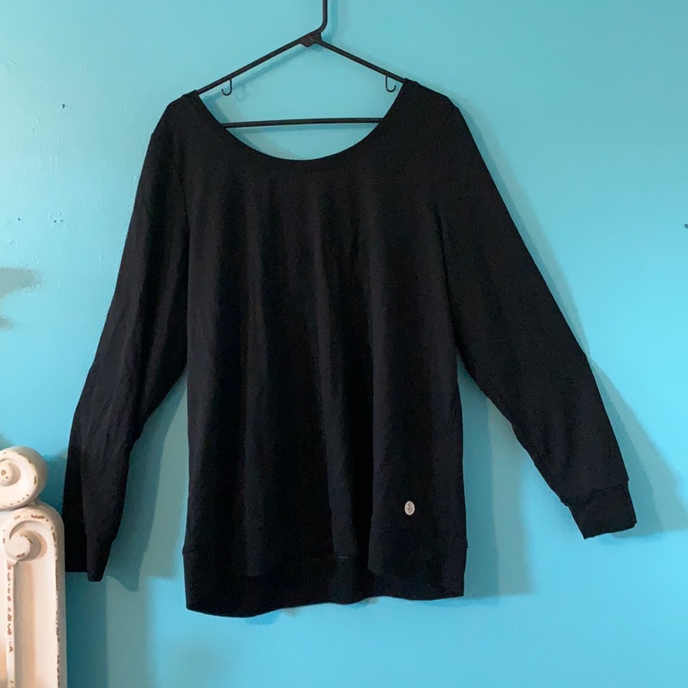 Torrid active size 2 sweater with back cutout.